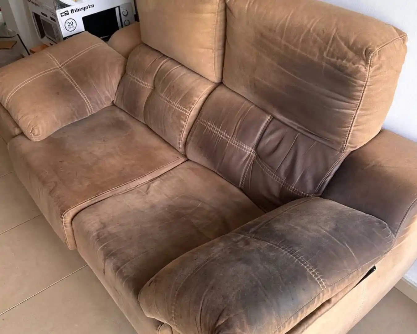 Antes de la limpieza de sofá de Girona